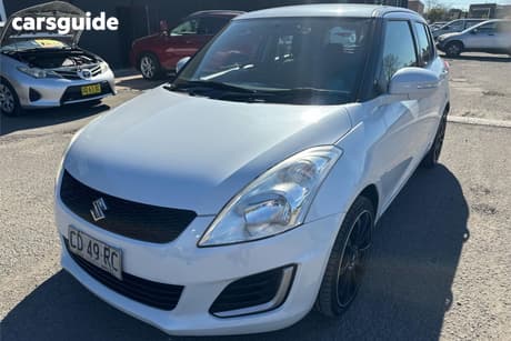 White 2015 Suzuki Swift Hatchback Gl