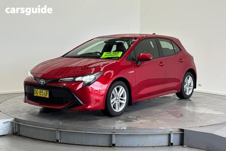 Red 2022 Toyota Corolla Hatchback Ascent Sport Hybrid