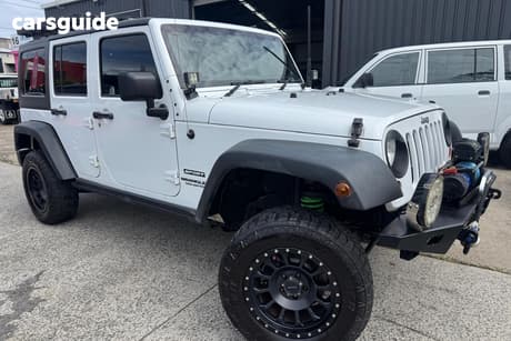 White 2012 Jeep Wrangler Softtop Unlimited Sport (4X4)