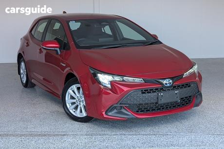 Red 2023 Toyota Corolla Hatchback Ascent Sport Hybrid