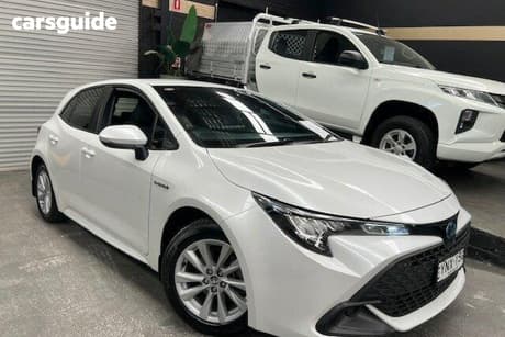 White 2023 Toyota Corolla Hatchback Ascent Sport Hybrid