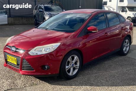 Red 2012 Ford Focus Sedan Trend