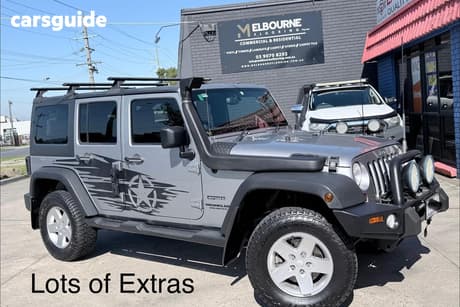 Grey 2013 Jeep Wrangler Softtop Unlimited Sport (4X4)