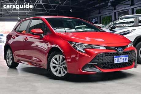 Red 2024 Toyota Corolla Hatchback Ascent Sport Hybrid