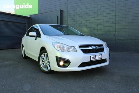 White 2012 Subaru Impreza Sedan 2.0I-L (Awd)
