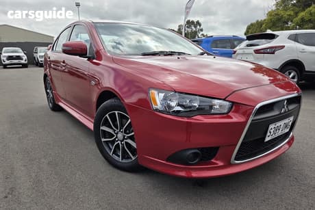 Red 2015 Mitsubishi Lancer Sedan Es Sport