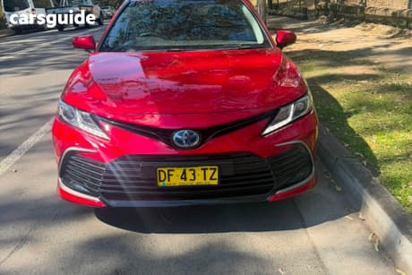 Red 2023 Toyota Camry Sedan Ascent Sport Hybrid