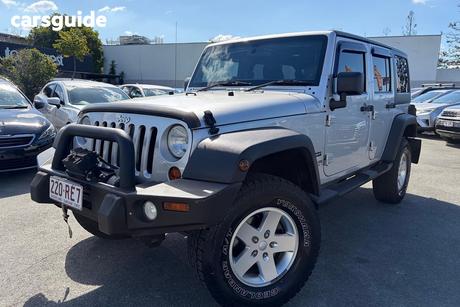 Silver 2012 Jeep Wrangler Softtop Unlimited Sport (4X4)