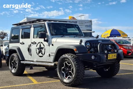 Silver 2010 Jeep Wrangler Softtop Unlimited Sport (4X4)