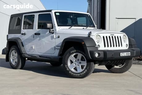 White 2013 Jeep Wrangler Softtop Unlimited Sport (4X4)