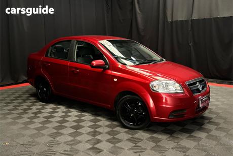 Red 2010 Holden Barina Sedan