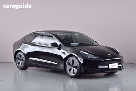 Black 2021 Tesla Model 3 Sedan Standard Range Plus Rwd