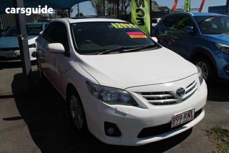White 2011 Toyota Corolla Sedan Ultima