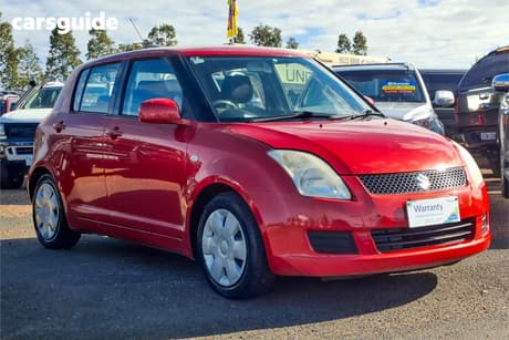 Red 2010 Suzuki Swift Hatchback Beat