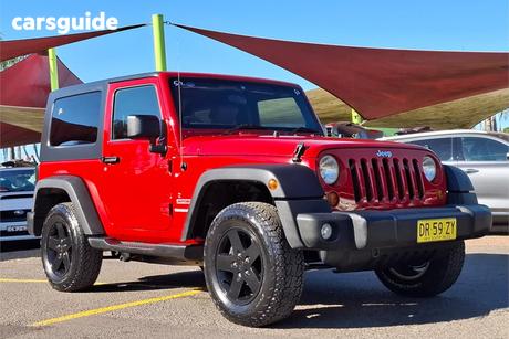 Red 2010 Jeep Wrangler Softtop Sport (4X4)