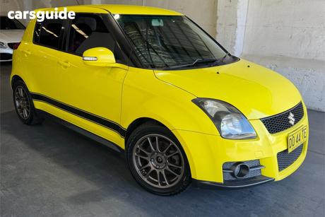 Yellow 2010 Suzuki Swift Hatchback Sport