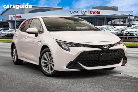White 2023 Toyota Corolla Hatchback Ascent Sport Hybrid