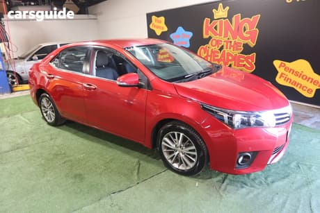 Red 2015 Toyota Corolla Sedan Sx