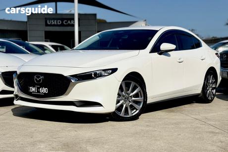 White 2024 Mazda 3 Sedan G20 Evolve