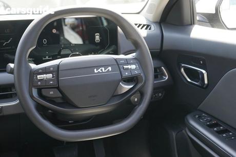 Yellow 2025 Kia K4 Sedan Sport