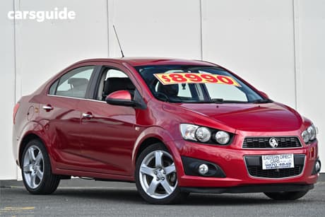 Red 2013 Holden Barina Sedan Cdx