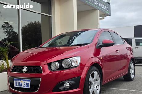 Red 2013 Holden Barina Sedan Cdx