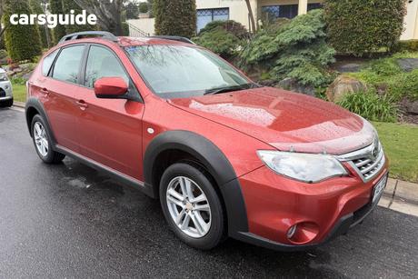 Red 2011 Subaru Impreza Hatchback Xv (Awd)