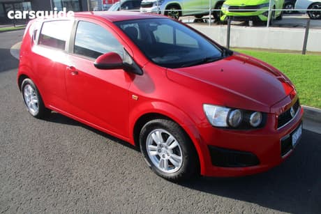 Red 2015 Holden Barina Sedan Cd