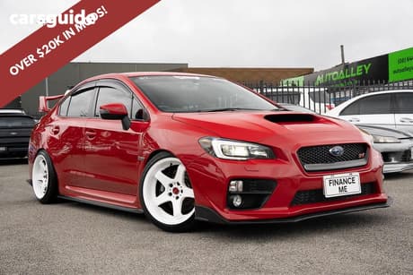 Red 2014 Subaru WRX Sedan Sti