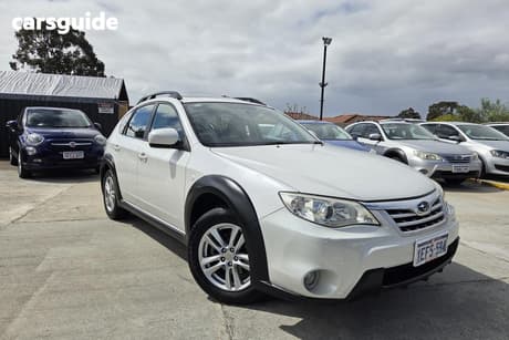 White 2010 Subaru Impreza Hatchback Xv (Awd)