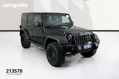 Black 2011 Jeep Wrangler Softtop Unlimited Sport (4X4)