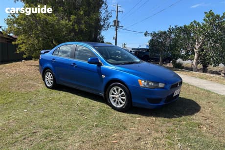 Blue 2011 Mitsubishi Lancer Sedan Sx