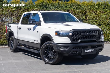 White 2025 RAM 1500 Crew Cab Utility Rebel Hurricane