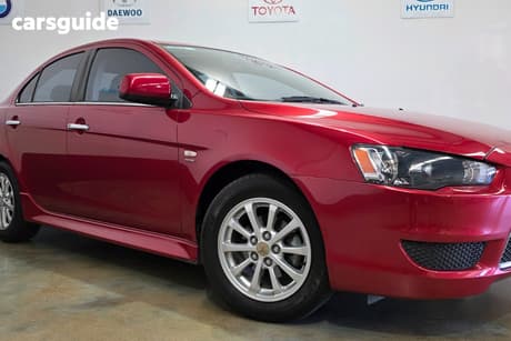 Red 2012 Mitsubishi Lancer Sedan Lx