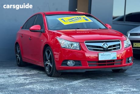 Red 2010 Holden Cruze Sedan Cdx