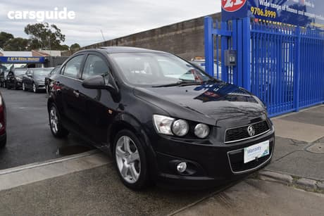 Black 2012 Holden Barina Sedan Cdx