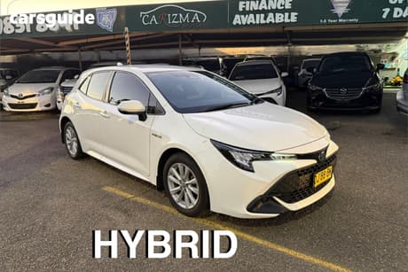 White 2023 Toyota Corolla Hatchback Ascent Sport Hybrid