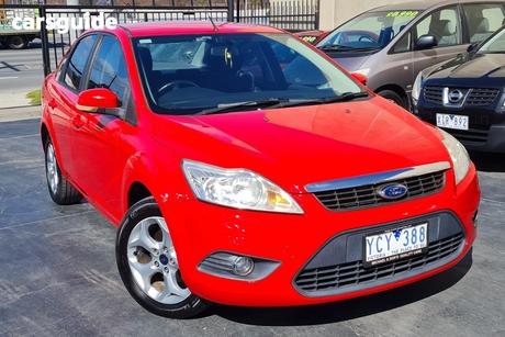 Red 2011 Ford Focus Sedan Lx