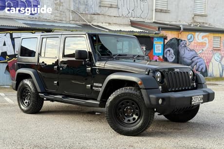Black 2017 Jeep Wrangler Unlimited Softtop Sport (4X4)