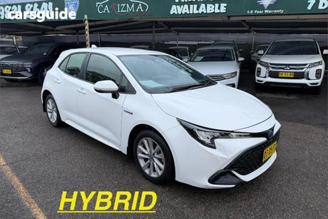 White 2023 Toyota Corolla Hatchback Ascent Sport Hybrid