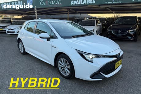 White 2023 Toyota Corolla Hatchback Ascent Sport Hybrid