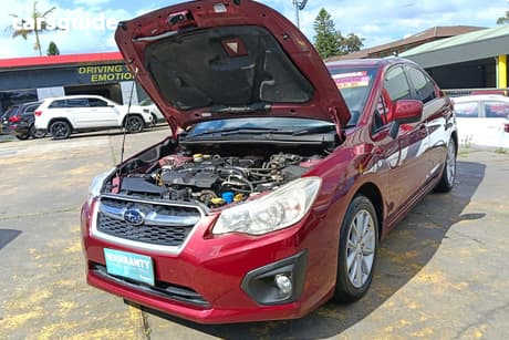 Red 2012 Subaru Impreza Sedan 2.0I-L (Awd)