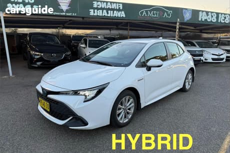 White 2023 Toyota Corolla Hatchback Ascent Sport Hybrid