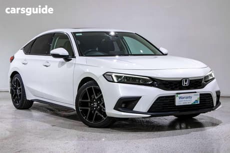White 2023 Honda Civic Hatchback E:Hev Lx