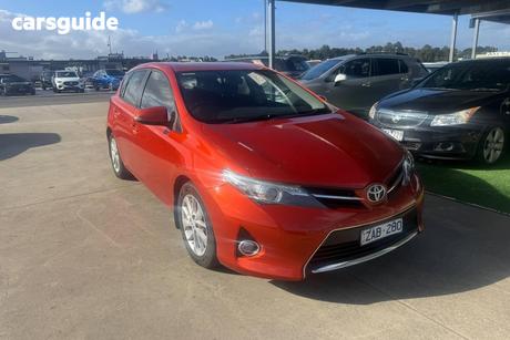 Orange 2013 Toyota Corolla Hatchback Ascent Sport