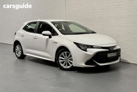 White 2023 Toyota Corolla Hatchback Ascent Sport Hybrid