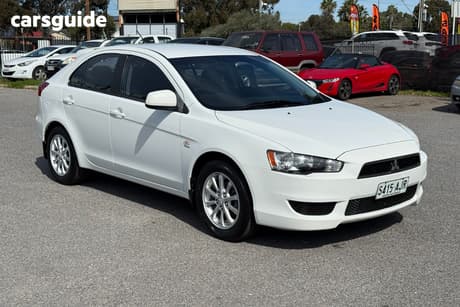 White 2010 Mitsubishi Lancer Sedan Sx