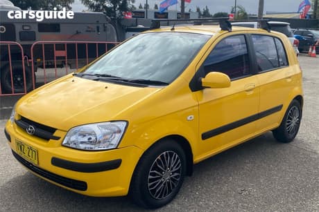 Yellow 2003 Hyundai Getz Hatchback Gl