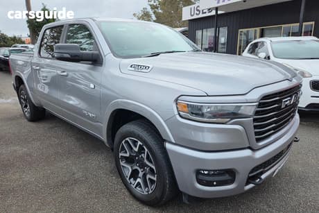 Silver 2025 RAM 1500 Crew Cab Utility Rebel Hurricane