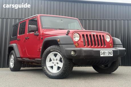Red 2007 Jeep Wrangler Softtop Unlimited Sport (4X4)